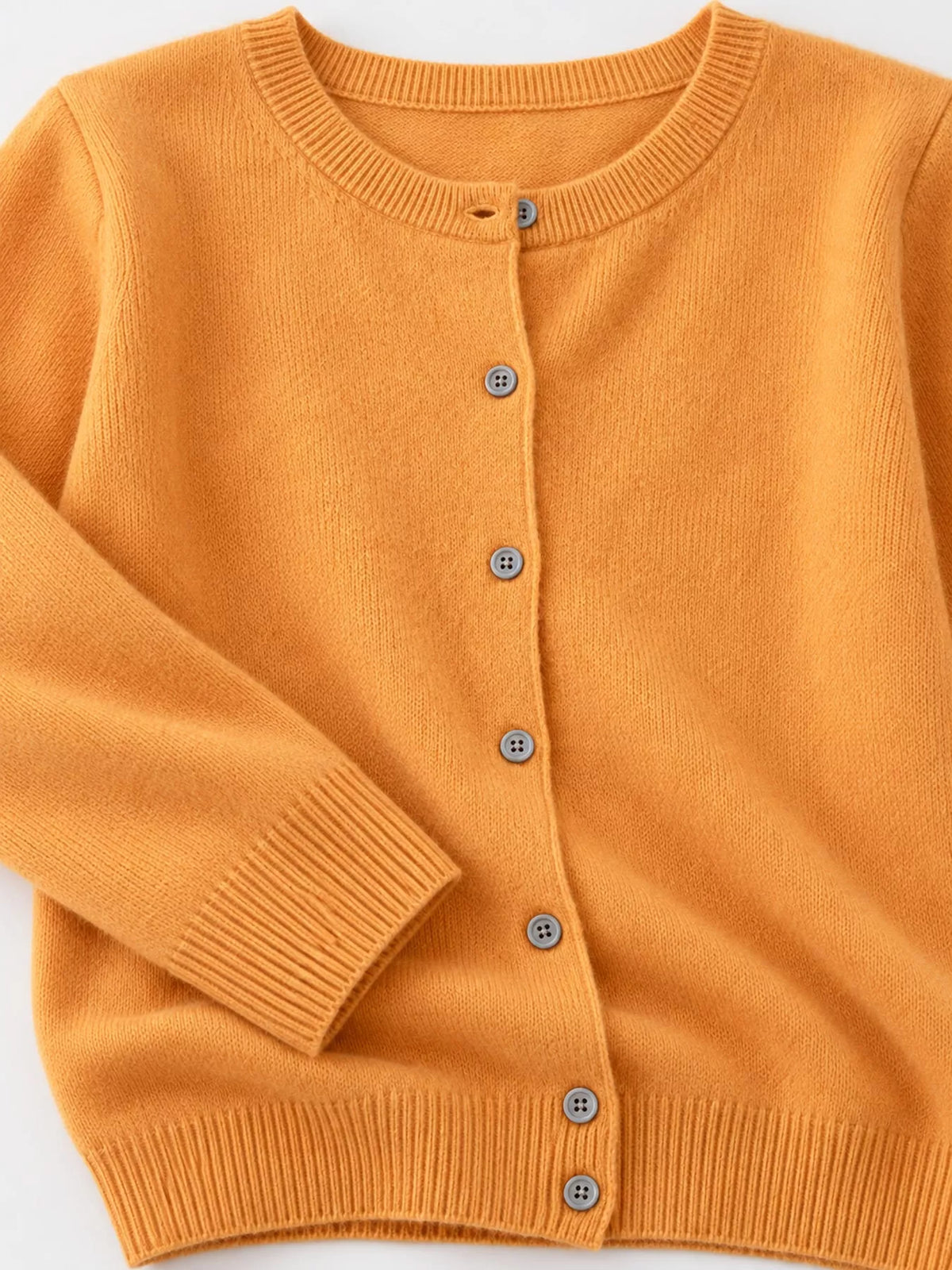 Button-down cardigan, mustard button cuff detail