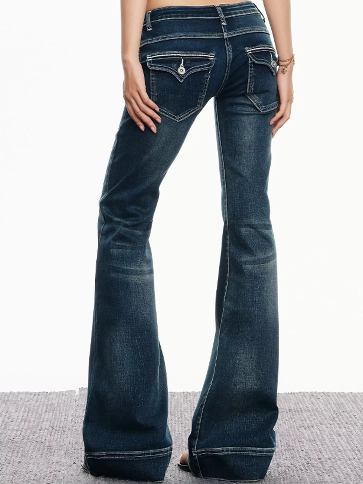Vintage Blue low-rise contrast-stitch flared jeans, back view
