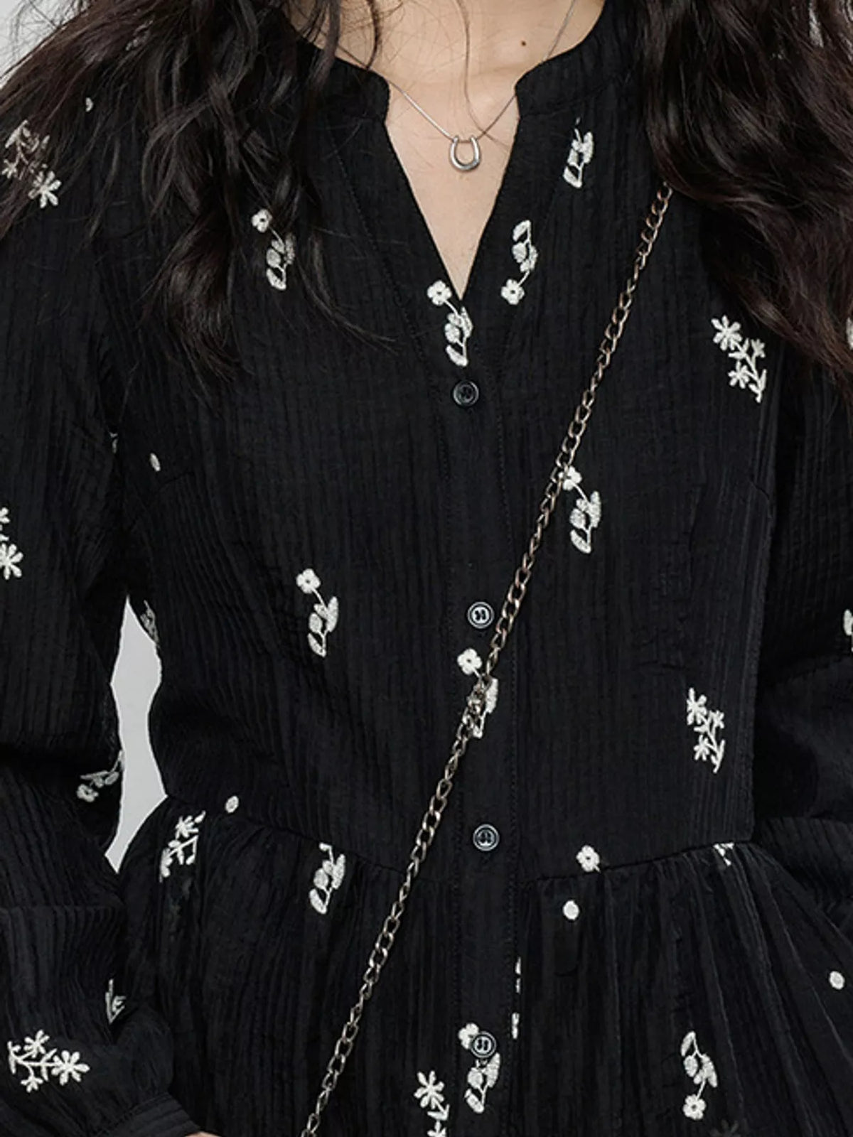 Women's Floral Long Sleeve Mini Dress in black floral — neckline detail view