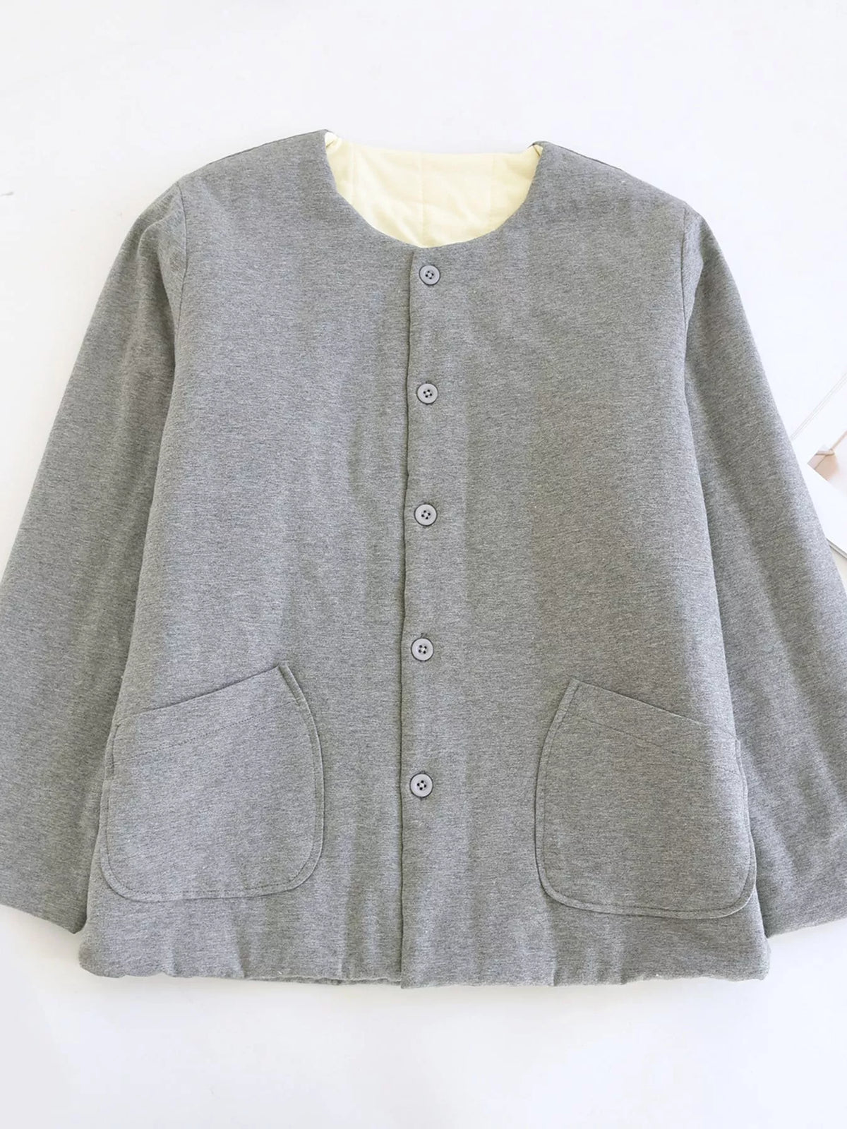 Quilted Crewneck Button-Down Jacket — garment front