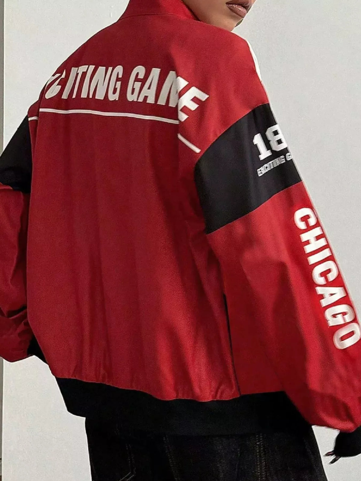 Red and black letter-print zip-front jacket, back view