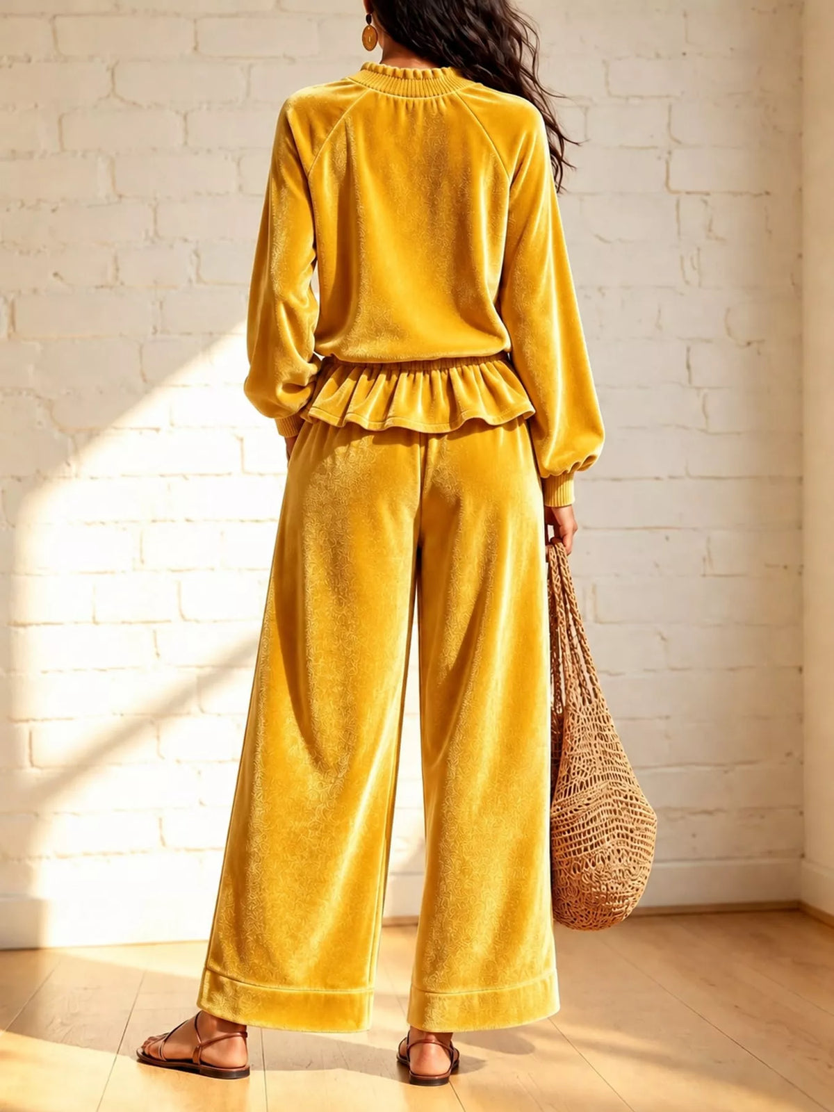 Yellow velvet ruffled hem top and wide-leg pants set — back view