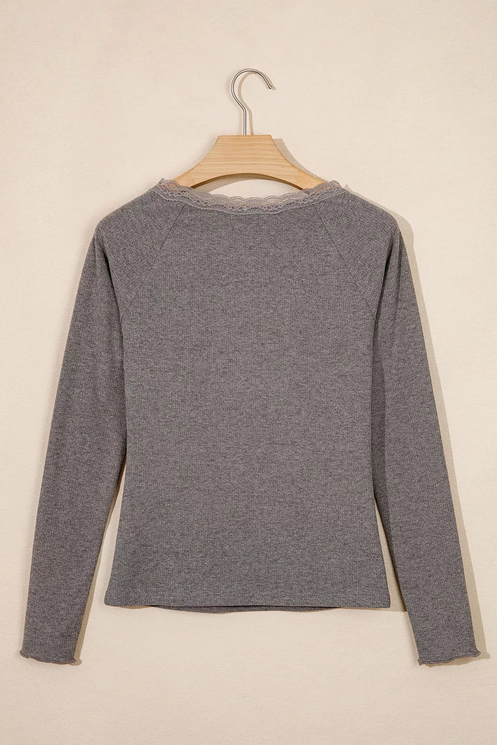 Ribbed Lace Trim V-Neck Button Detail Top in gray, hanger back view