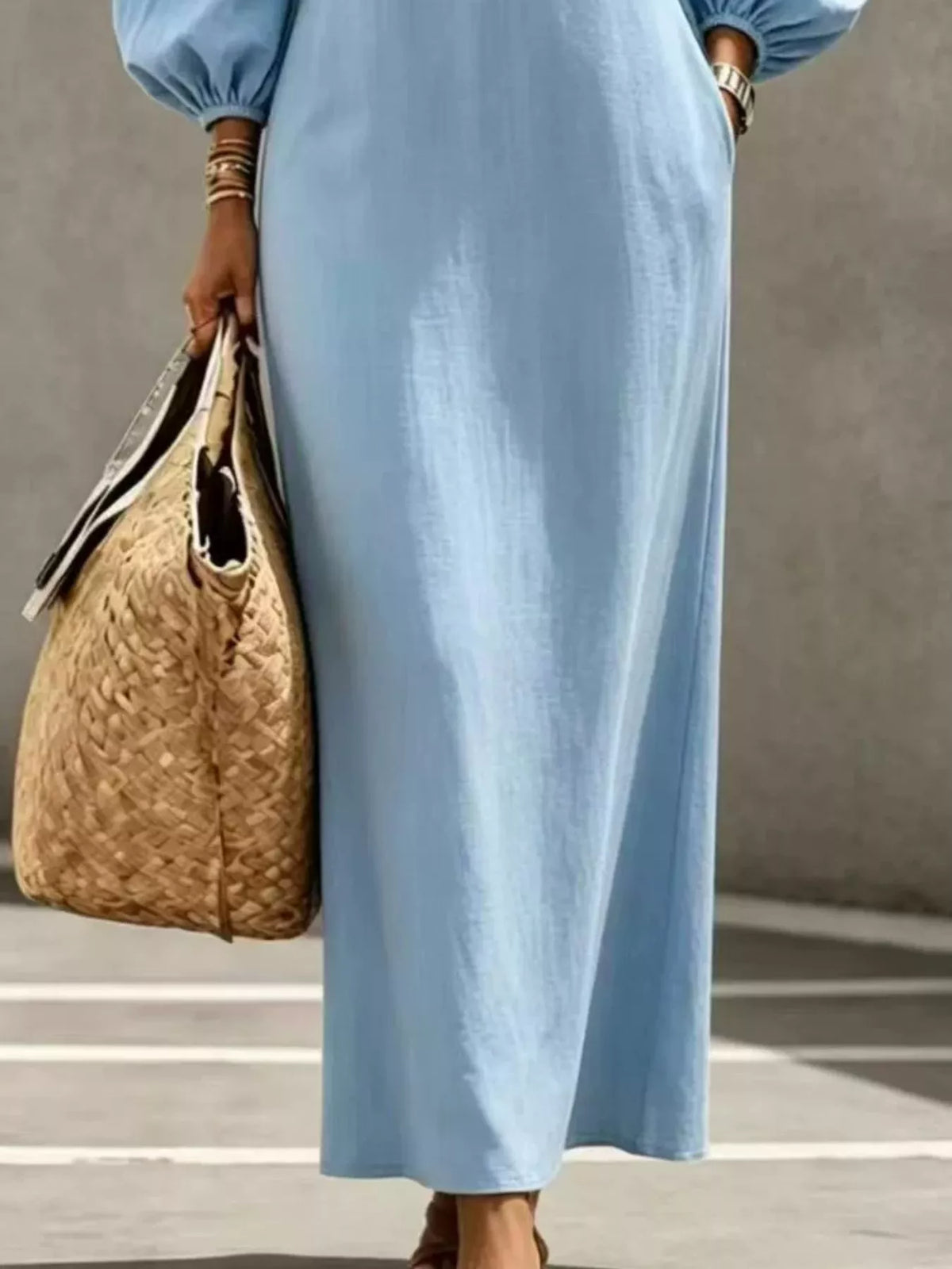 Light blue balloon-sleeve maxi dress, skirt detail