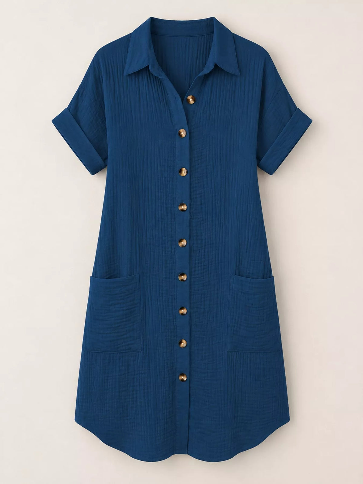 Dark blue textured button-front shirt dress with pockets, on hanger