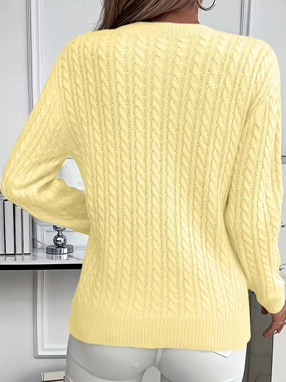 Yellow cable knit round neck sweater, back view