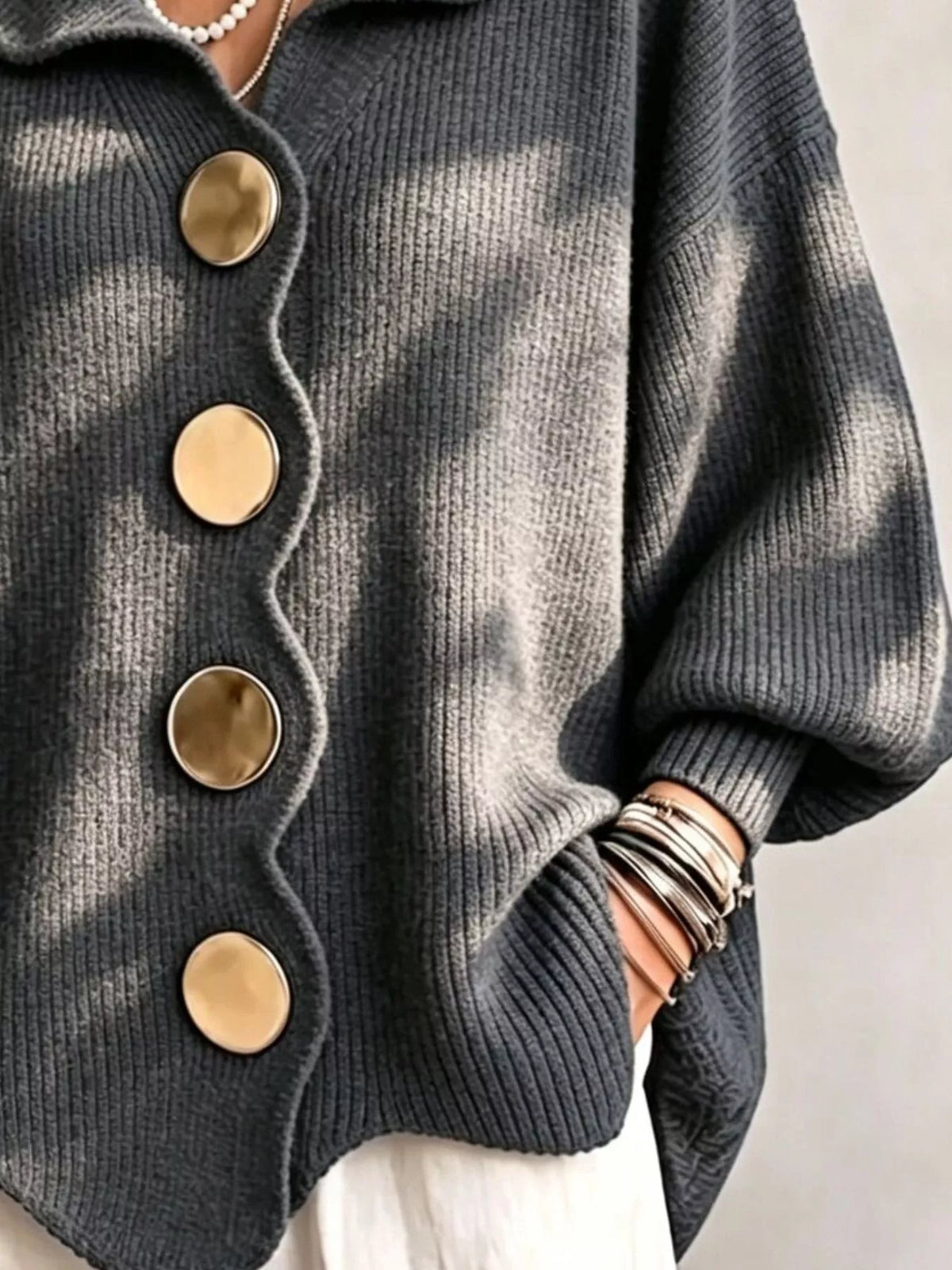 Dark gray scalloped-edge knit cardigan, button and cuff detail