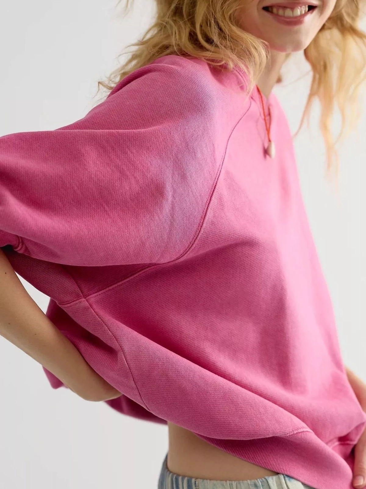 Women's Raglan Short-Sleeve Sweatshirt in pink — sleeve detail view
