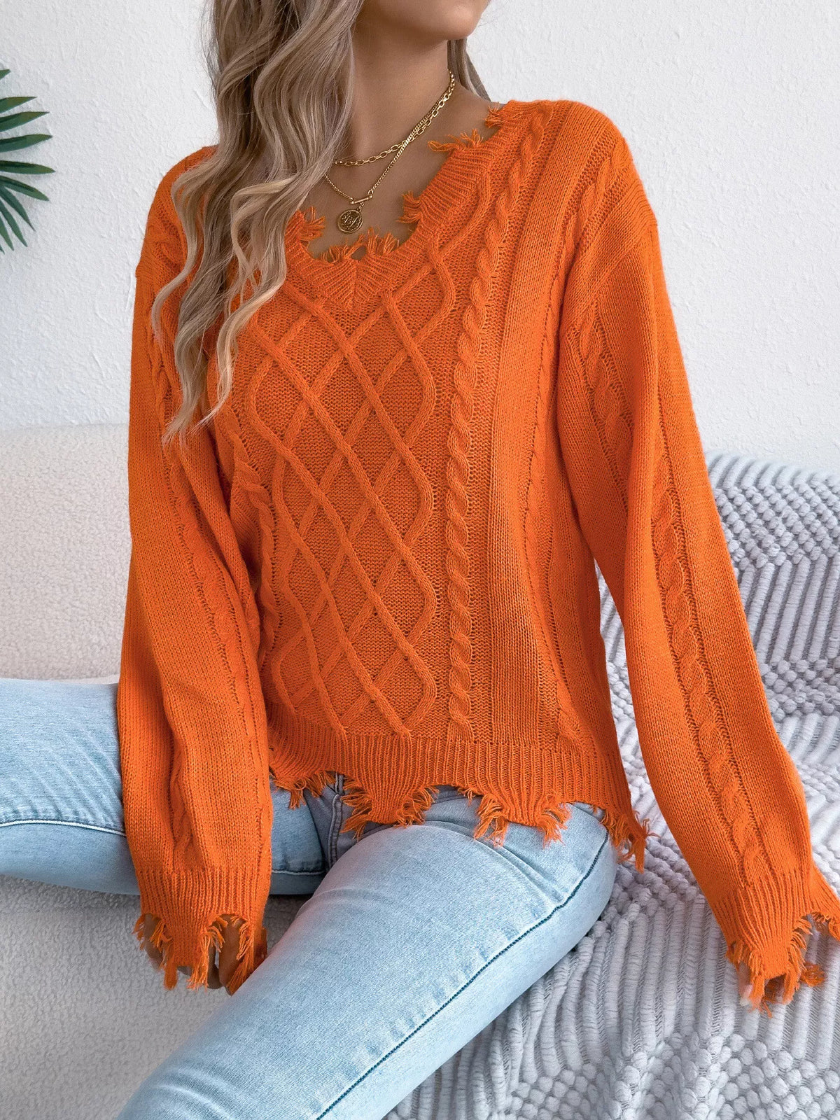 V-Neck Distressed Hem Cable Knit Sweater in orange, front view