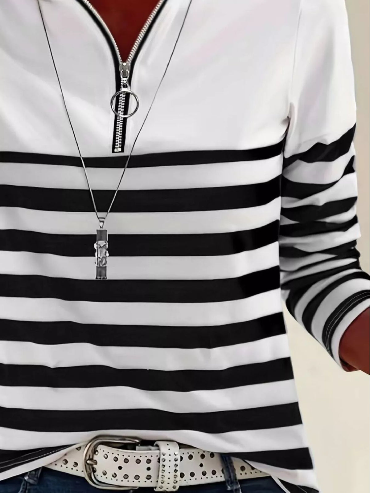 Black and white quarter-zip striped top, stripe detail