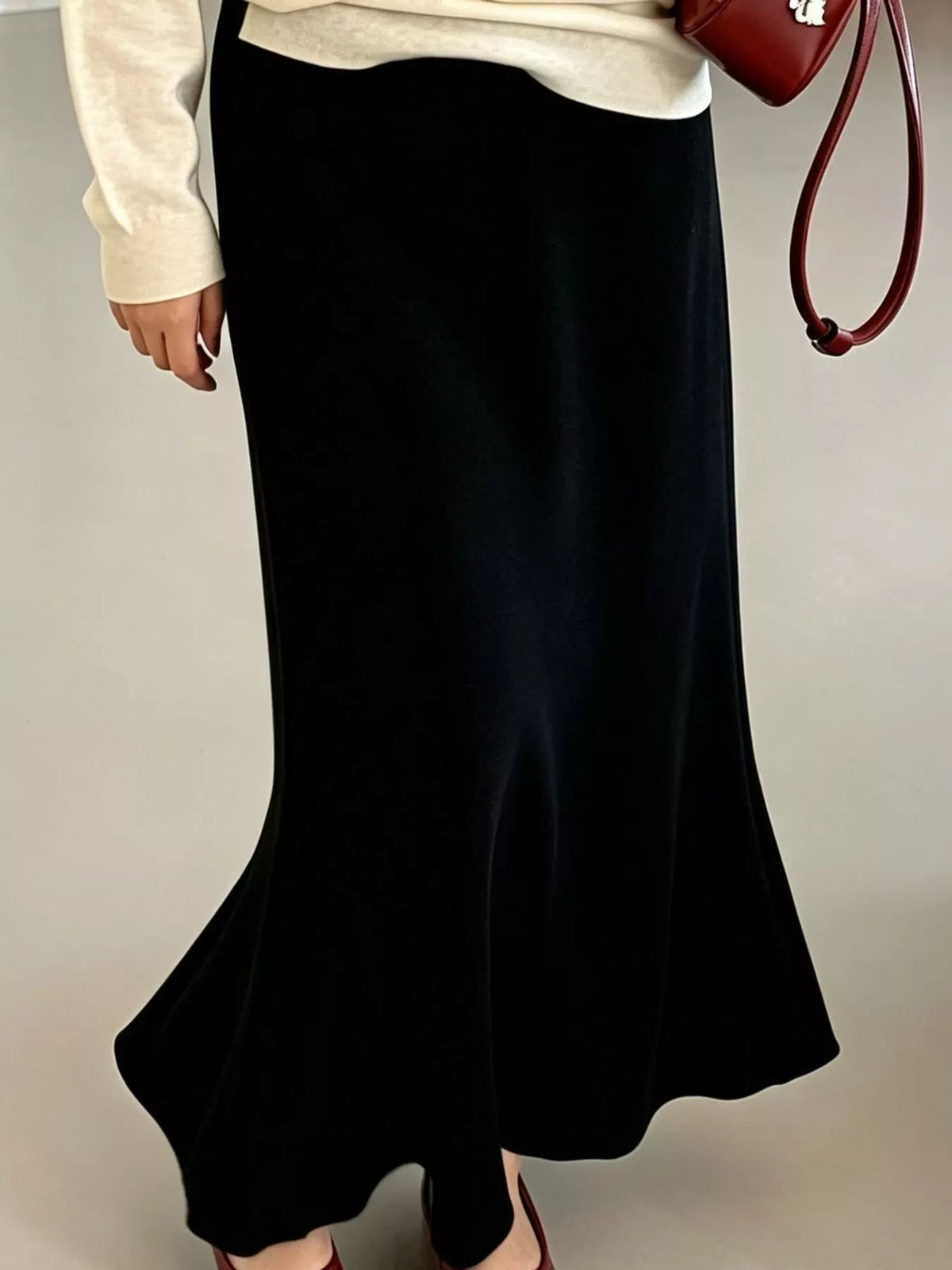 Black high-waisted flared skirt