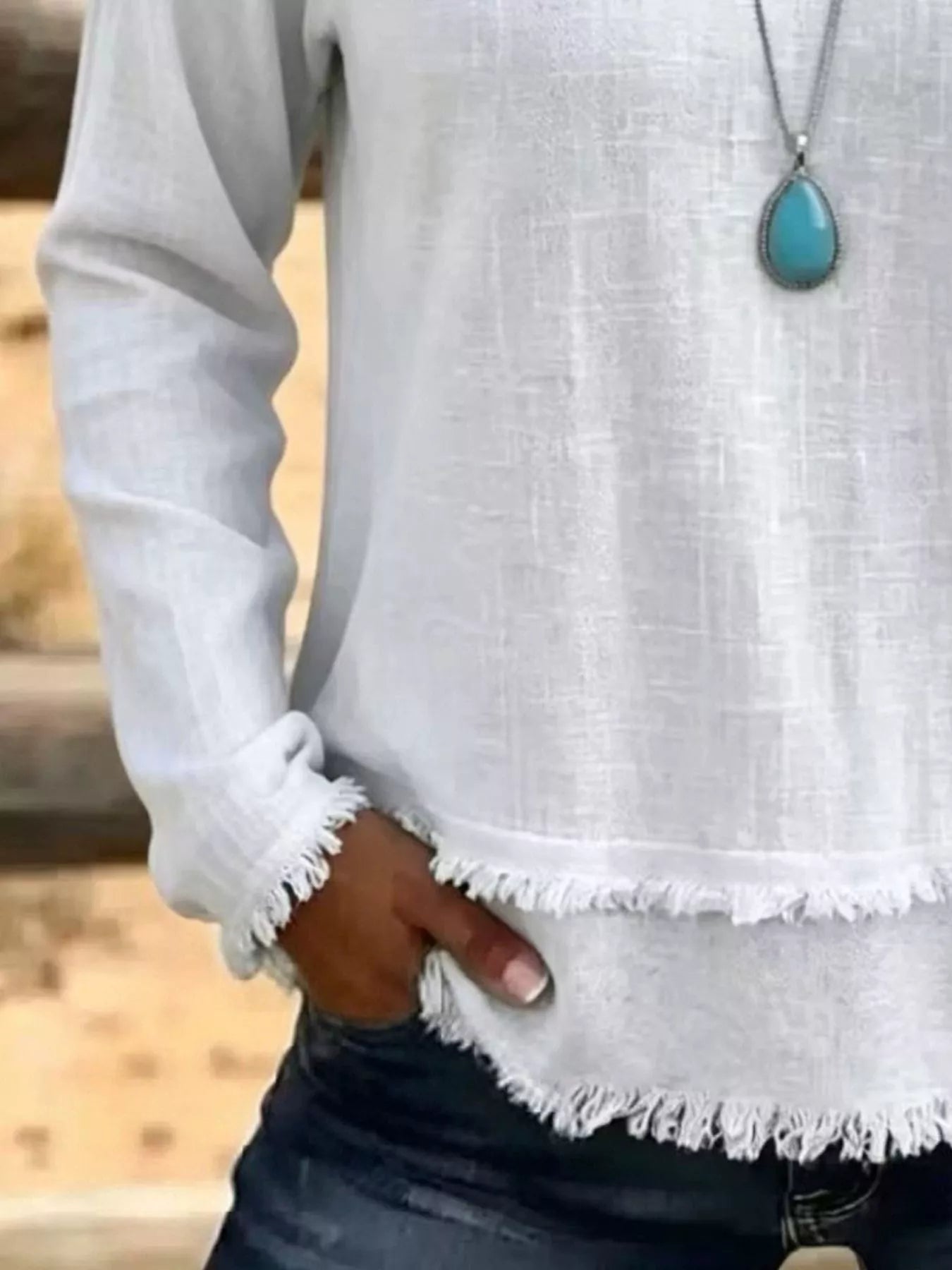 Trendsi V-Neck Long Sleeve Blouse with Frayed Hem Detail -