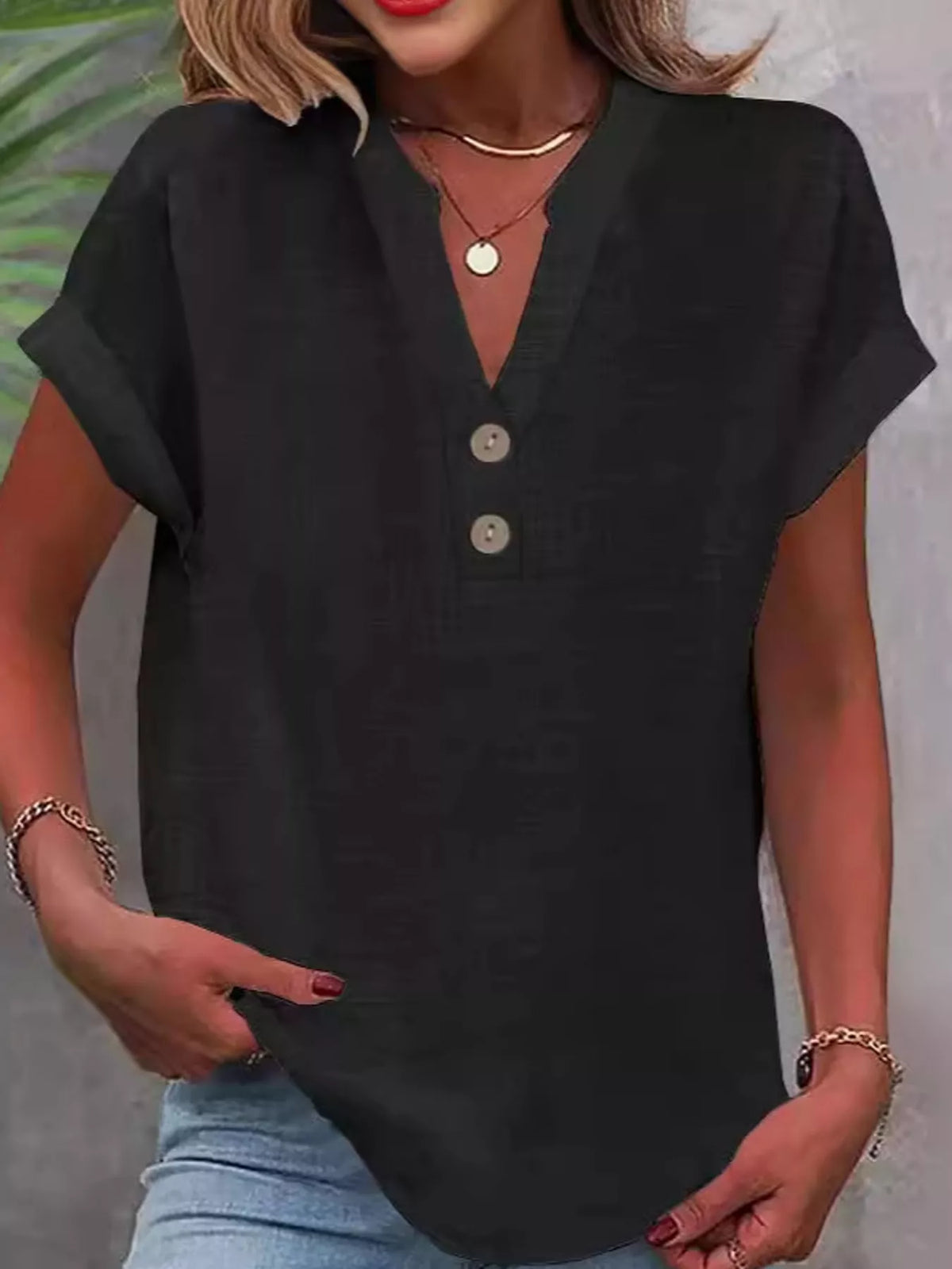 Black button detail short sleeve blouse, front view