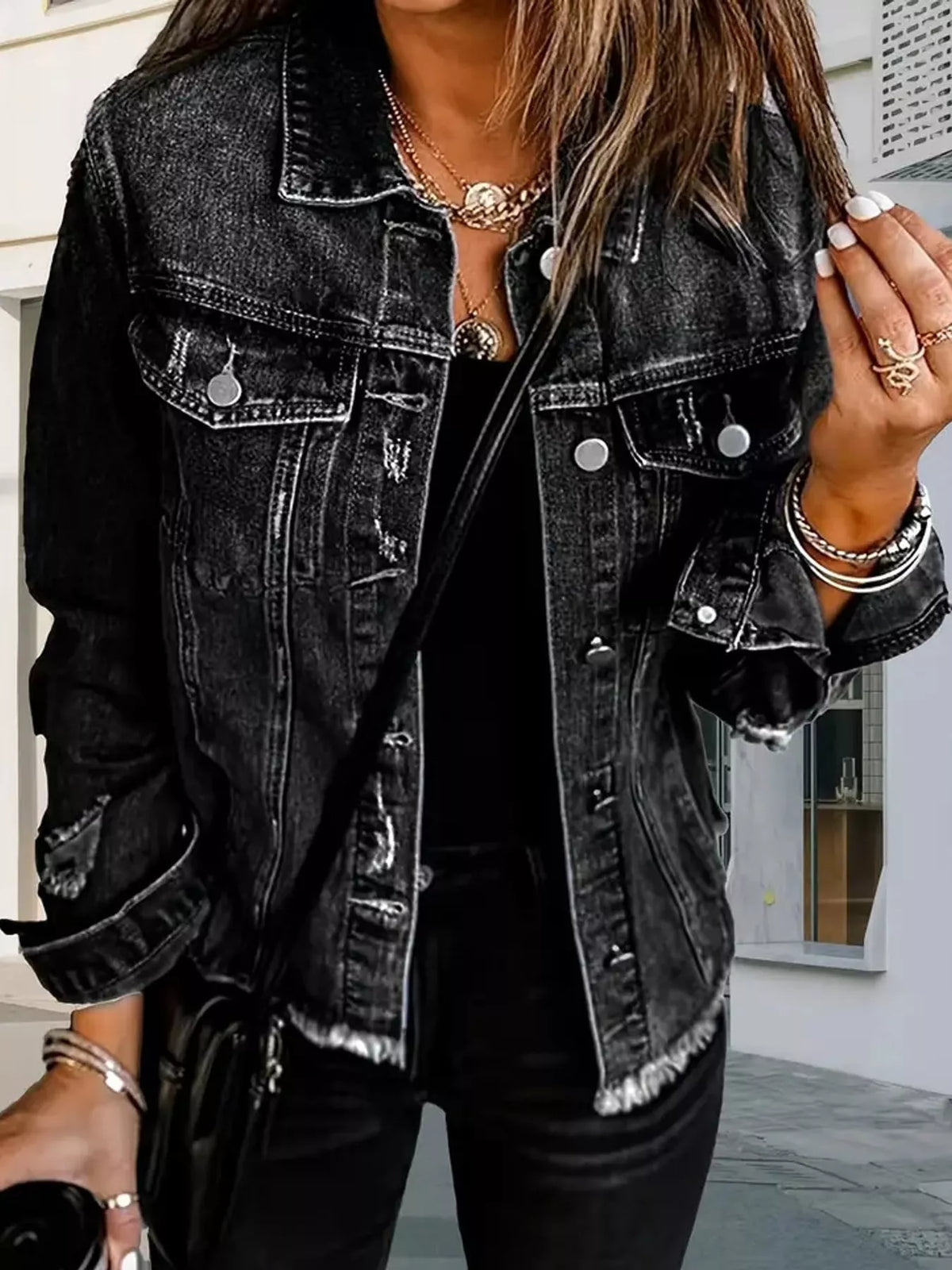 Women's Distressed Raw Hem Denim Jacket in black — collar detail view