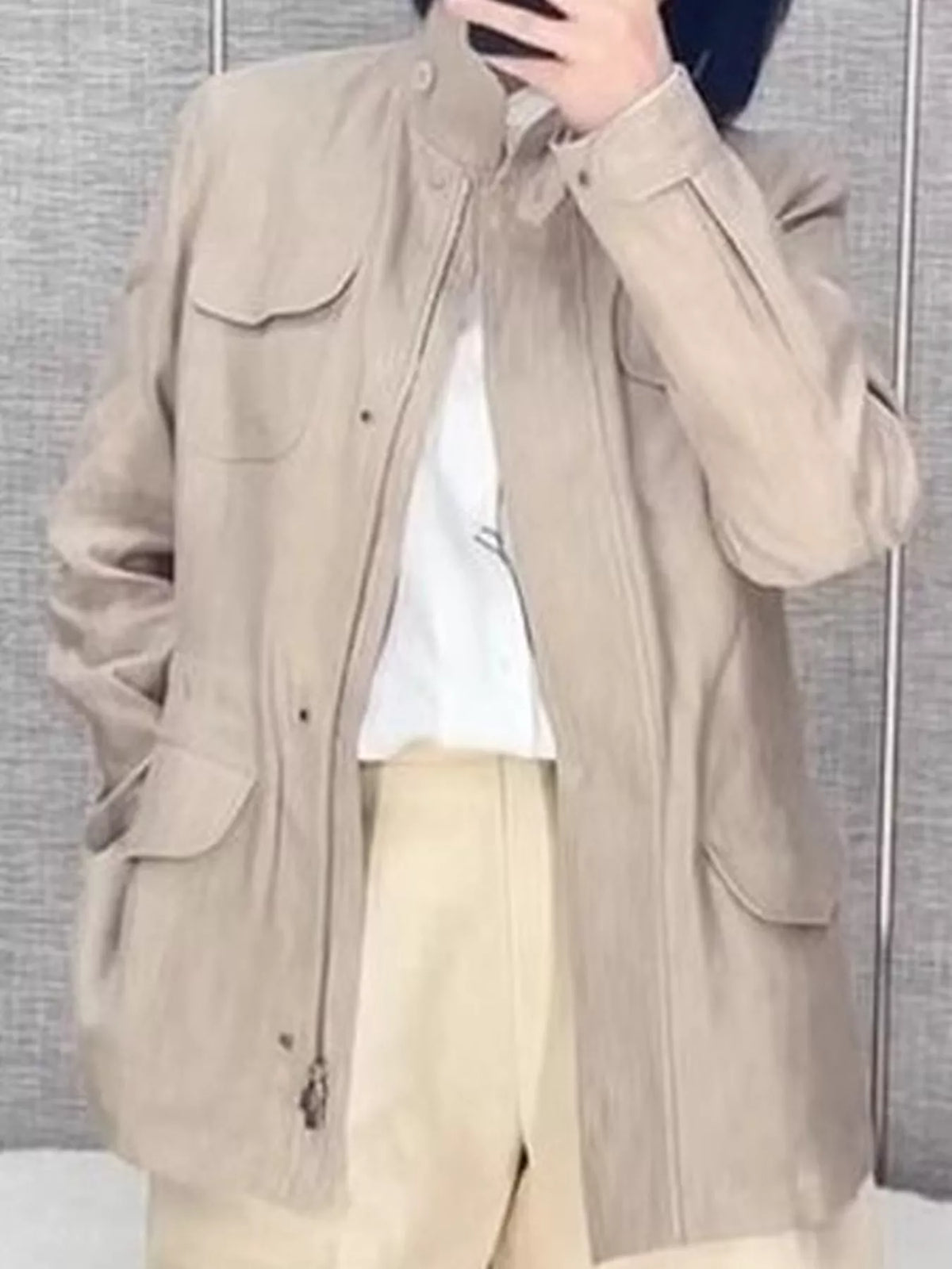 Beige lightweight multi pockets jacket — front view
