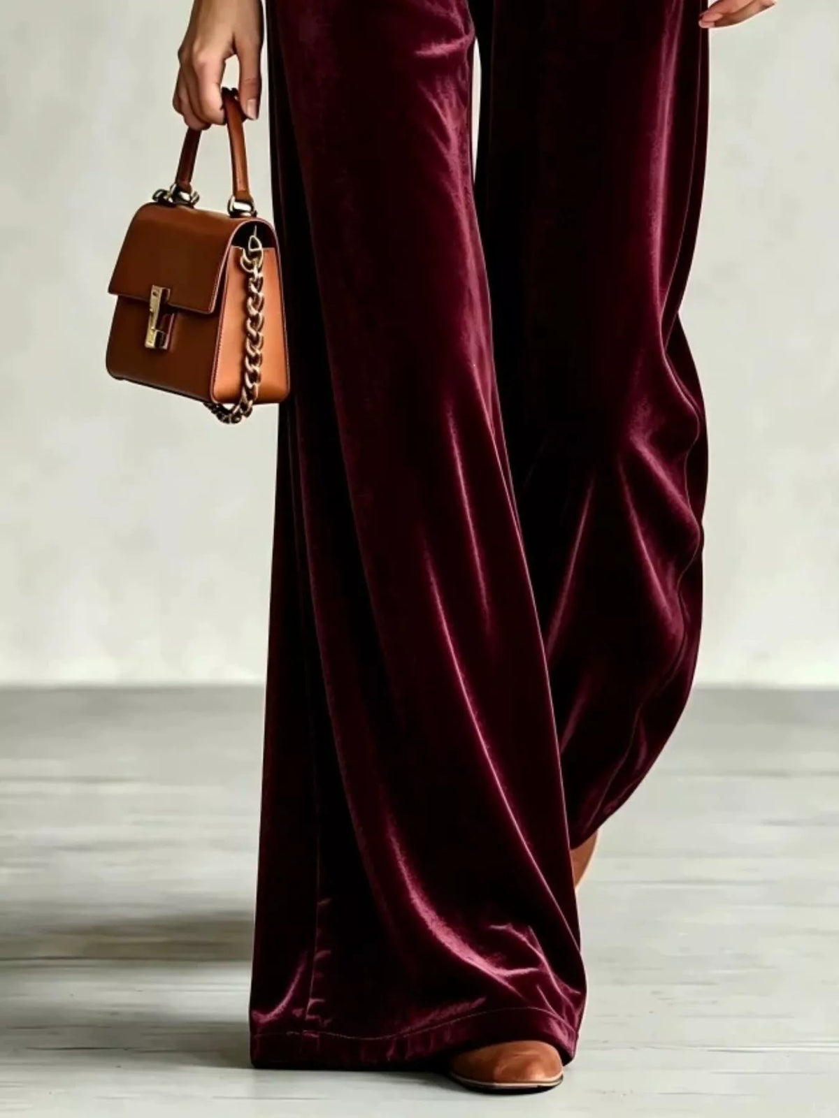 Burgundy wide-leg drawstring velvet pants, leg and velvet detail