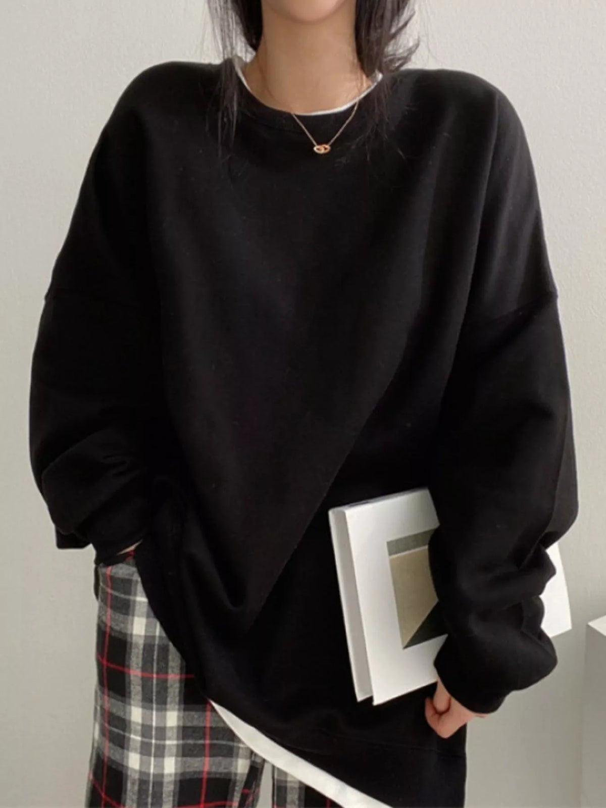 Black long-sleeve sweatshirt