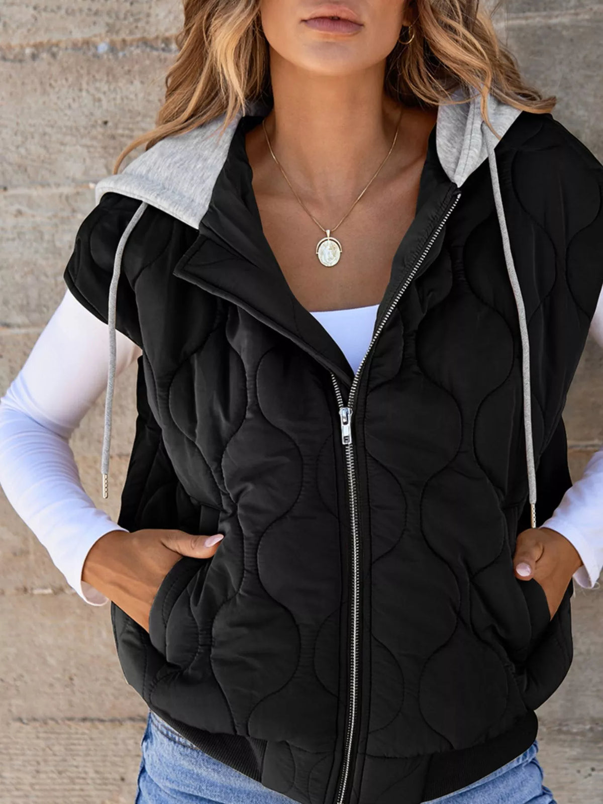 Hooded puffer vest, black zipped front