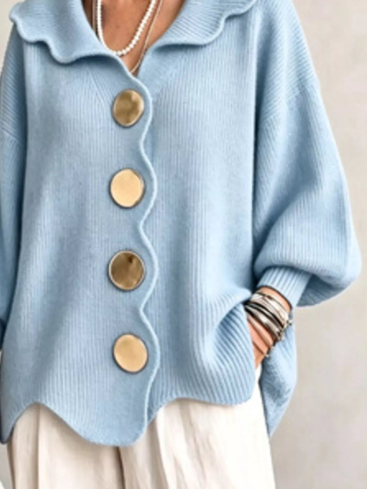 Light blue scalloped-edge knit cardigan, collar detail