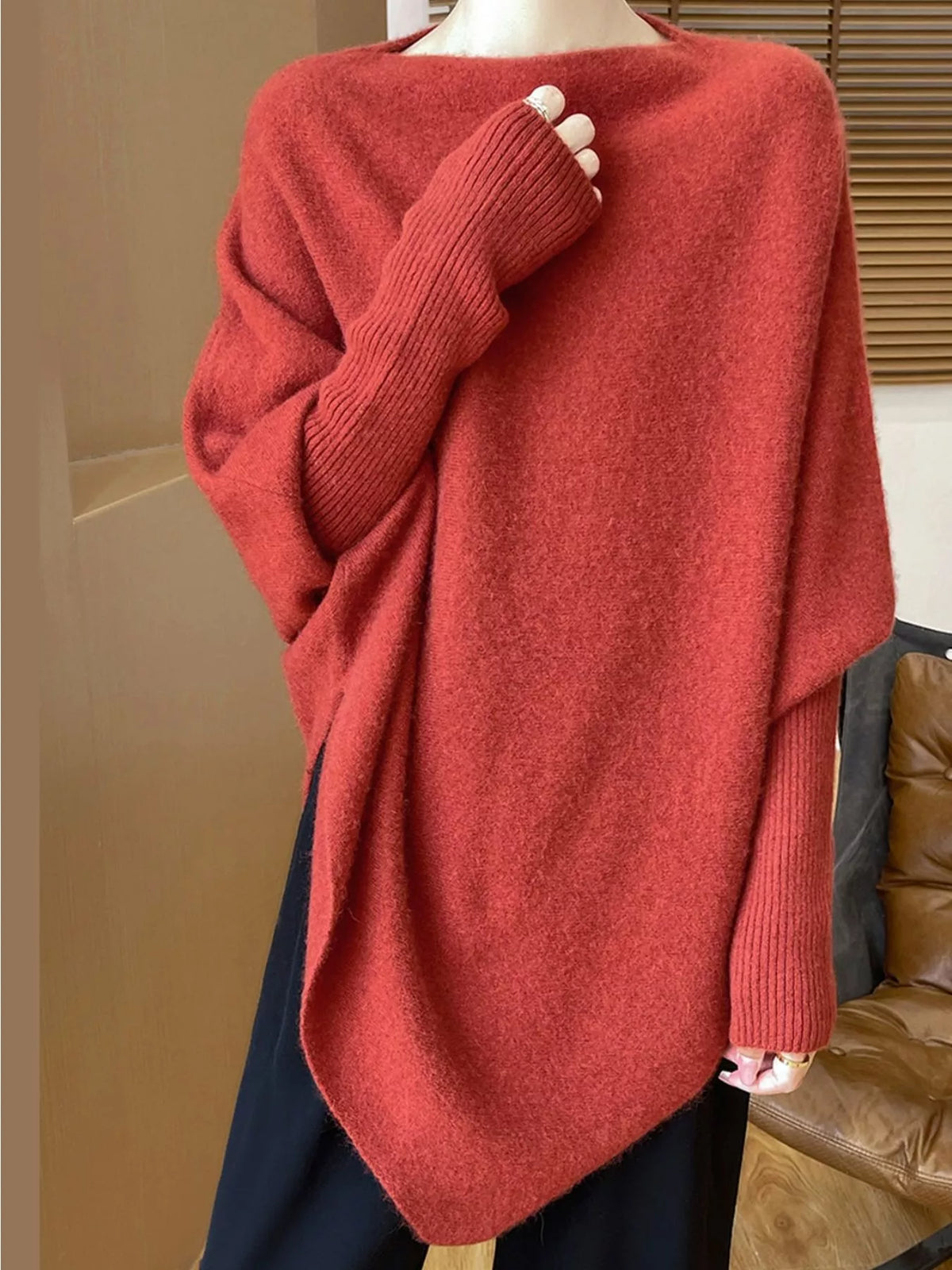 Red asymmetrical lantern sleeve sweater — front view