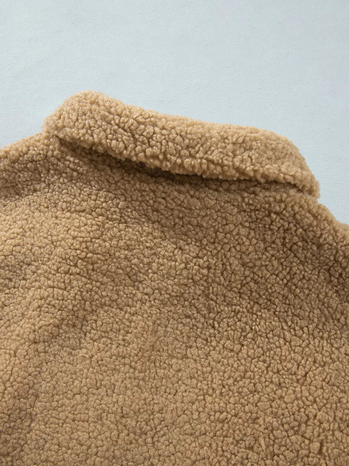 Camel fleece zip-front jacket with contrasting seam trim, back collar detail