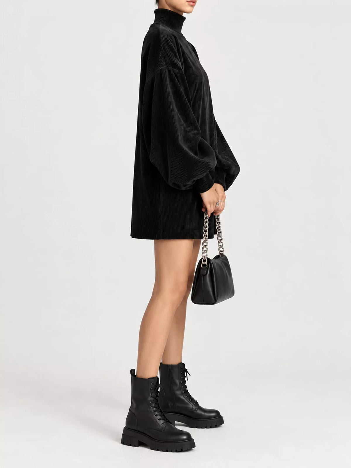 Corduroy Mock Neck Lantern Sleeve Mini Dress in black, side view
