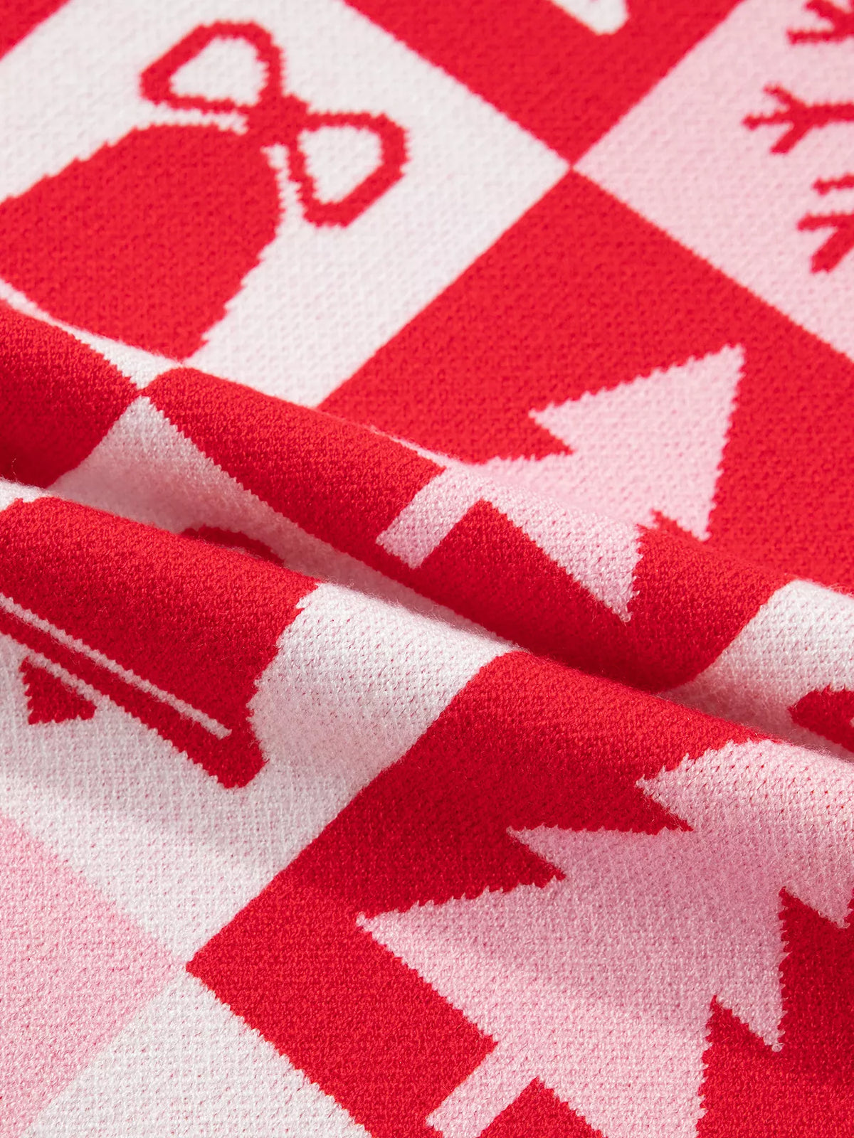 Christmas motifs and knit texture on pink and red christmas christmas patchwork round neck sweater