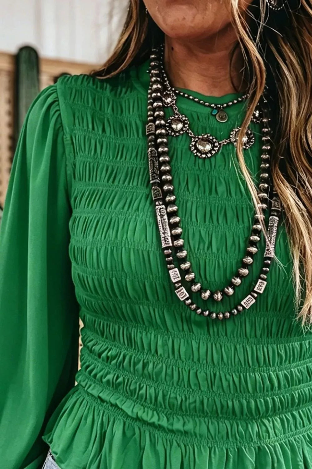 Smocked balloon-sleeve peplum blouse