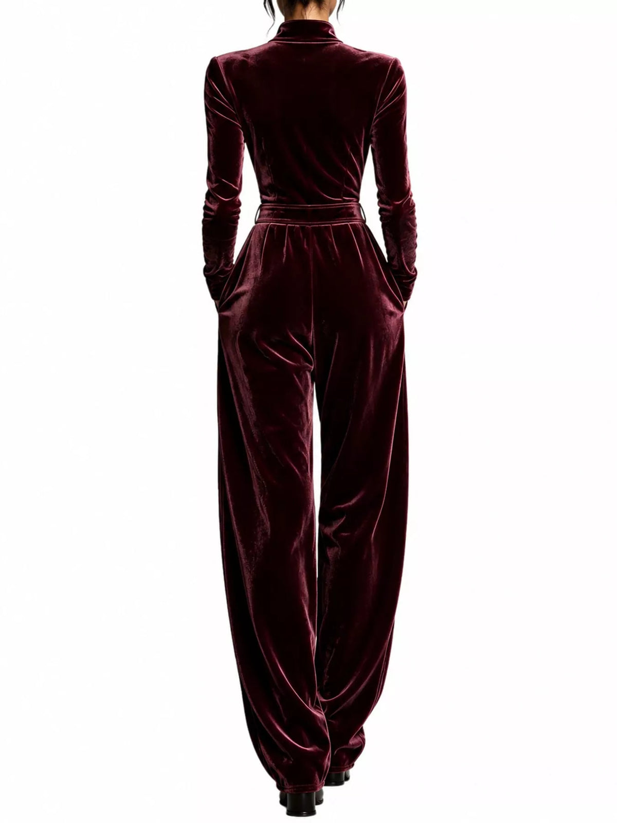 Burgundy velvet zip up jumpsuit with tie waist, back view