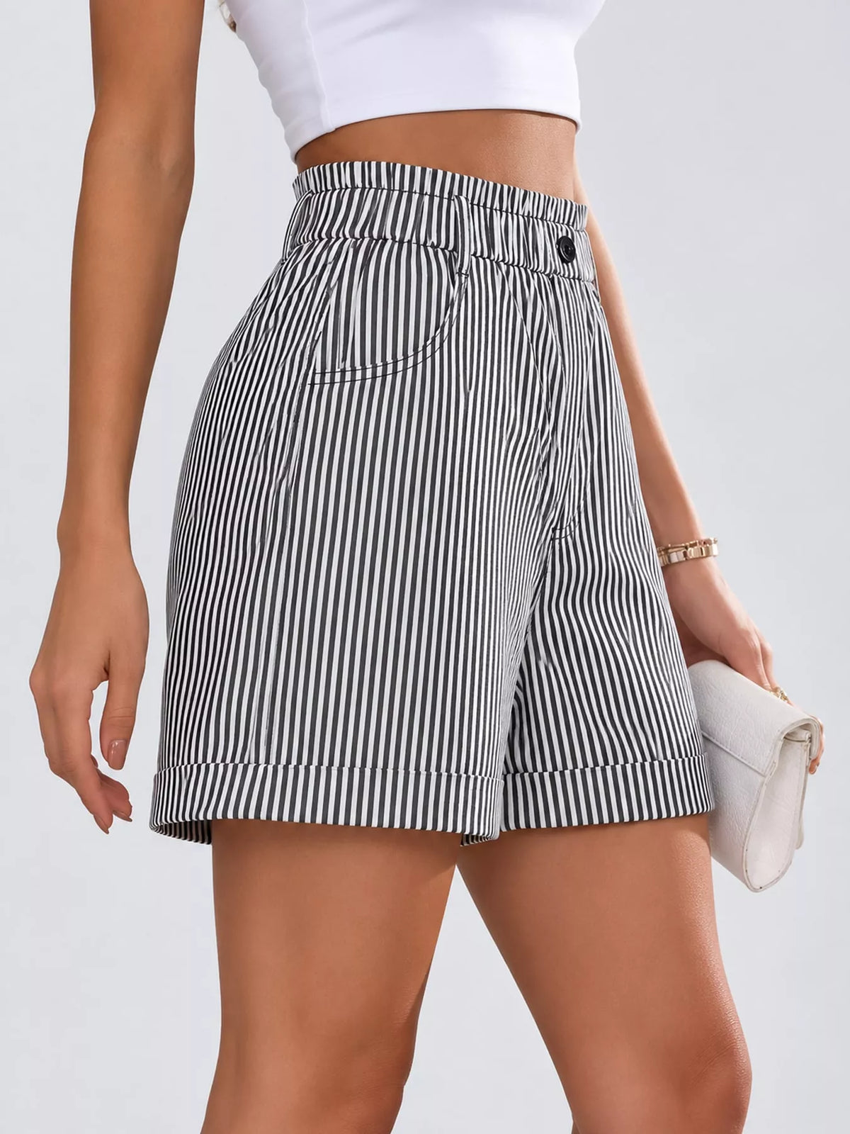 Black and white high waisted striped shorts, side view