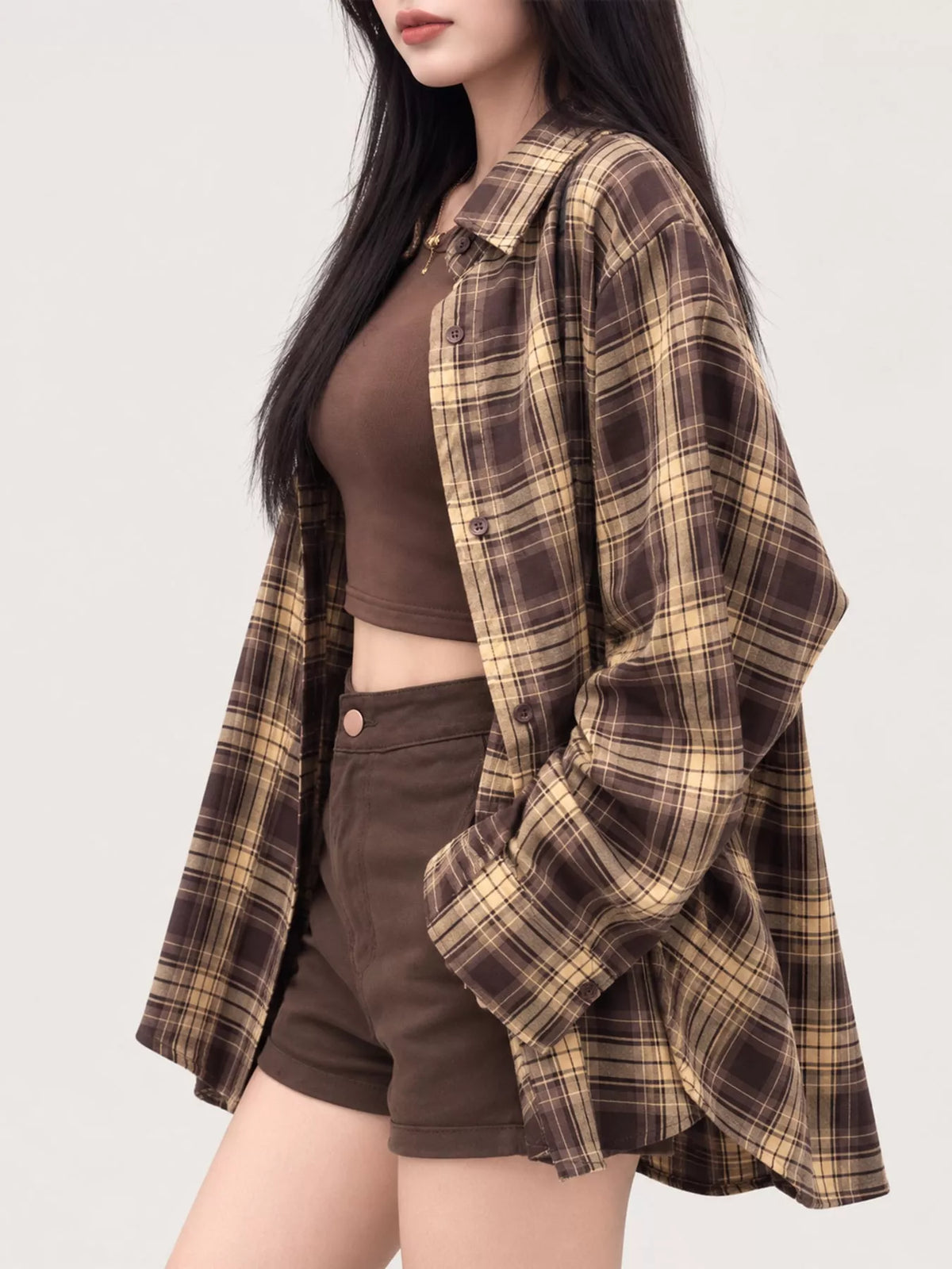 Brown and cream loose-fit plaid shirt, side view