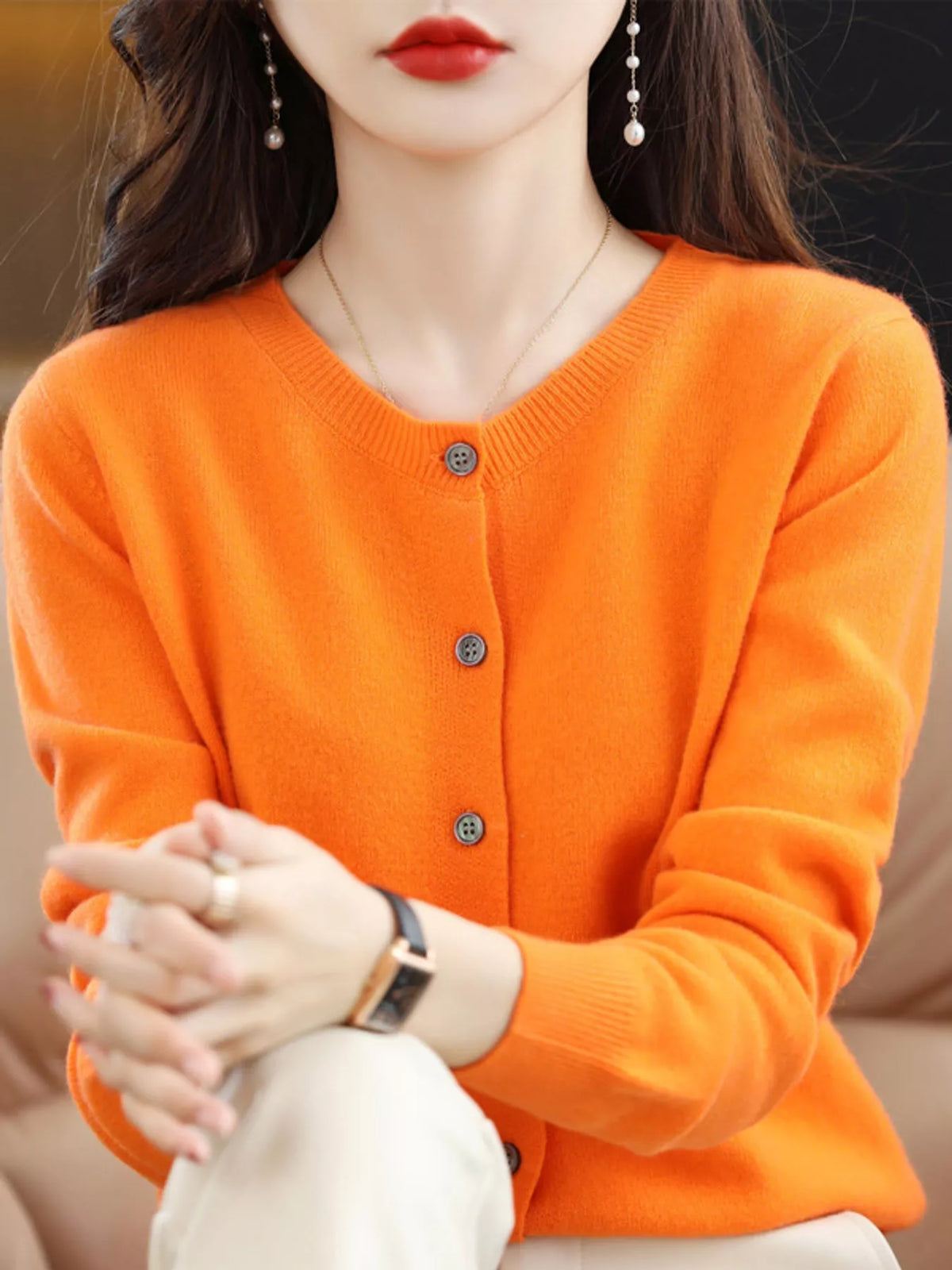 Orange crew neck button-front cardigan