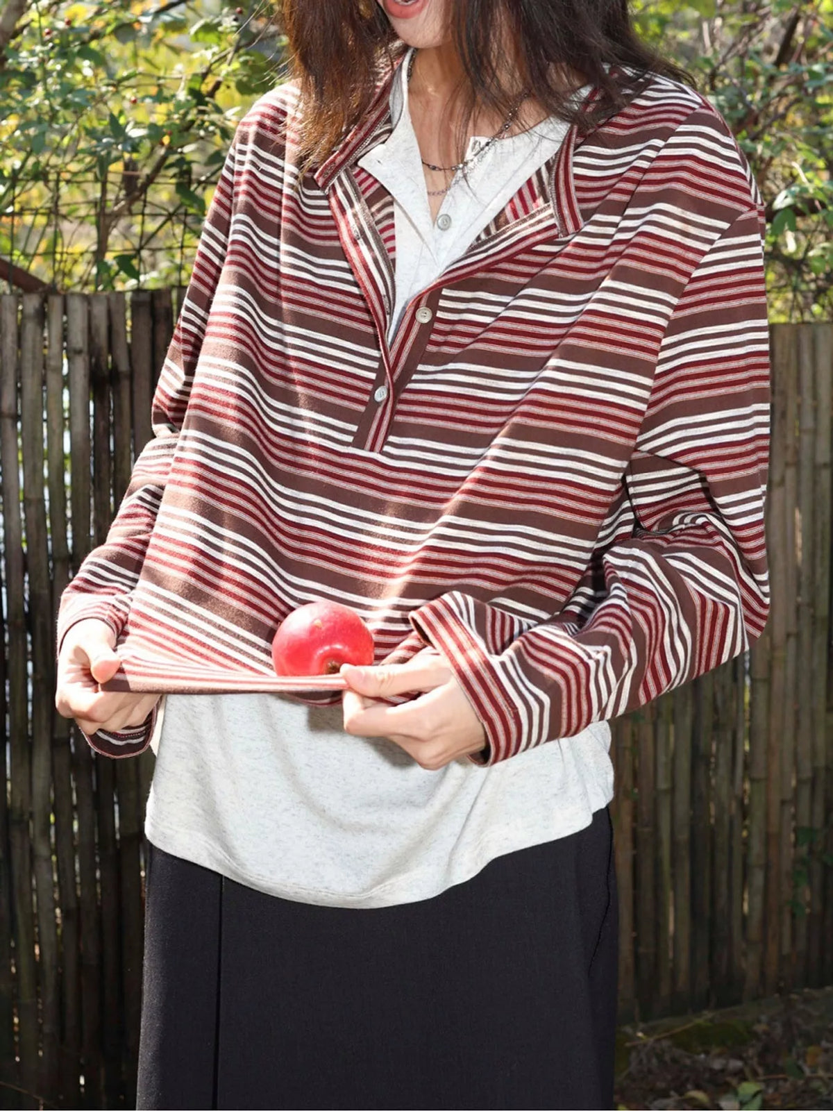 Rust and white striped long sleeve quarter-zip T-shirt, hem detail