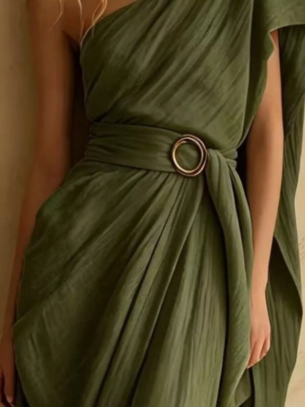 Green one-shoulder draped maxi dress, waist buckle detail