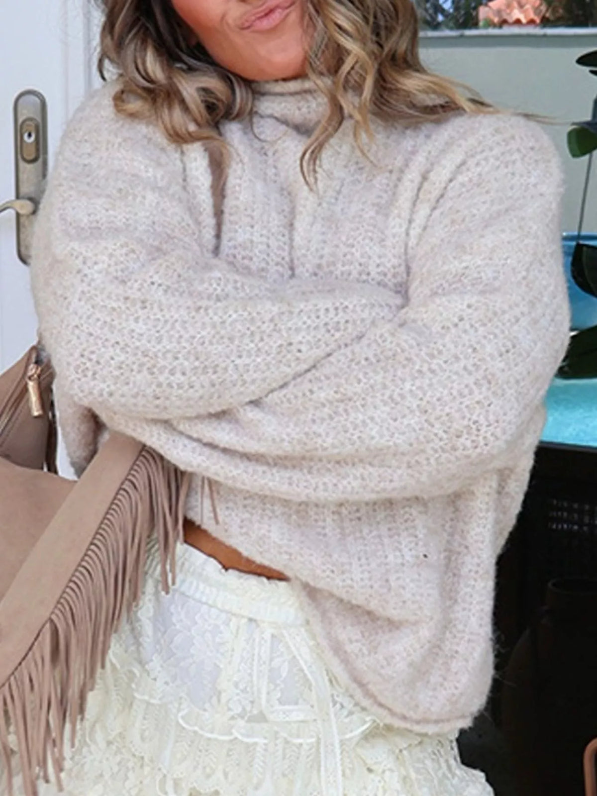 Cream mock-neck chunky-knit sweater, sleeve and knit detail