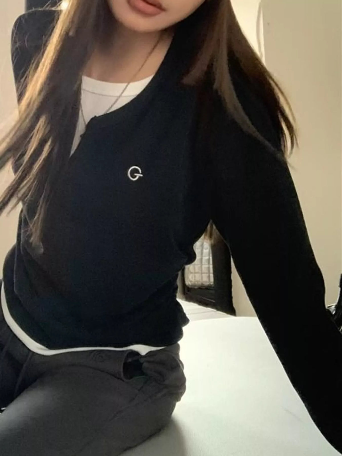 Layered T-shirt, black seated view