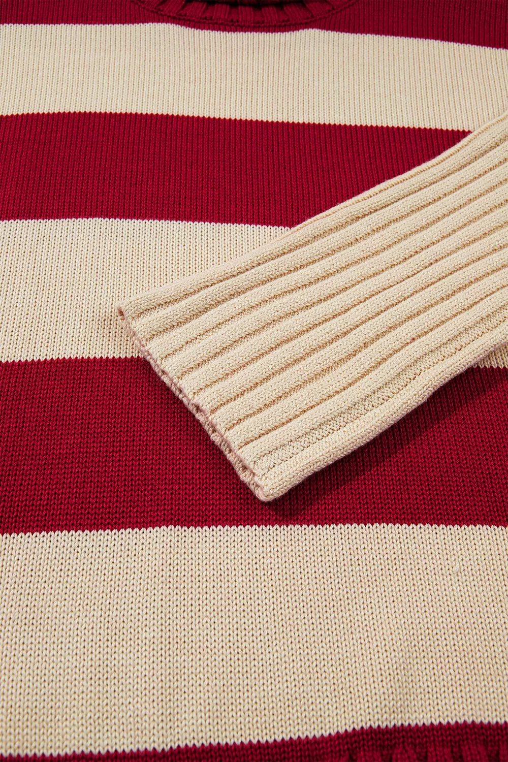 Striped High Neck Ribbed Trim Sweater in red and cream, cuff detail
