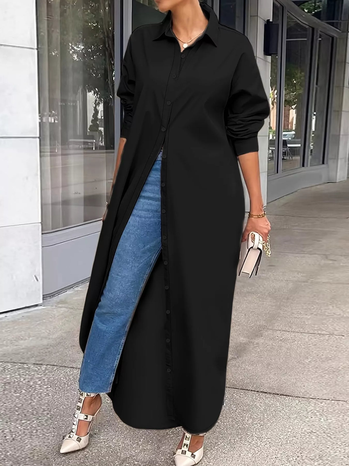 Longline button-down shirt, black front with rolled sleeves
