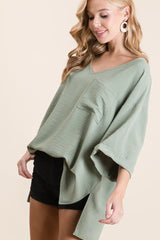 Trendsi BiBi Flowy Woven V-Neck Top with Rolled Up Cuffs -