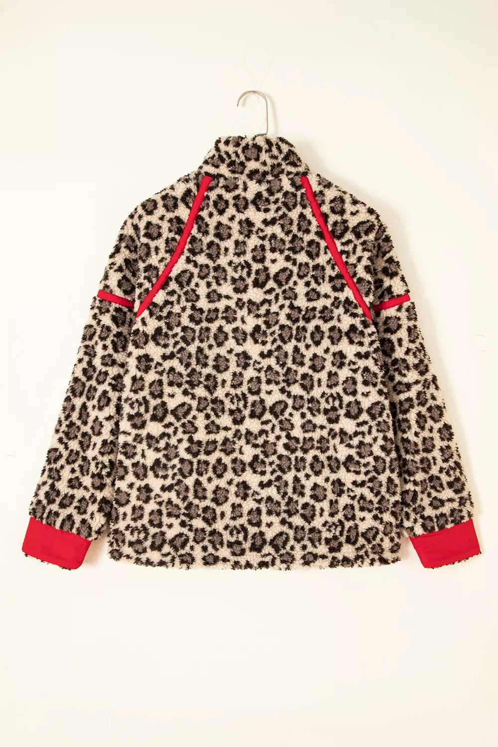 Leopard leopard half-zip sweatshirt with red trim, back on hanger.
