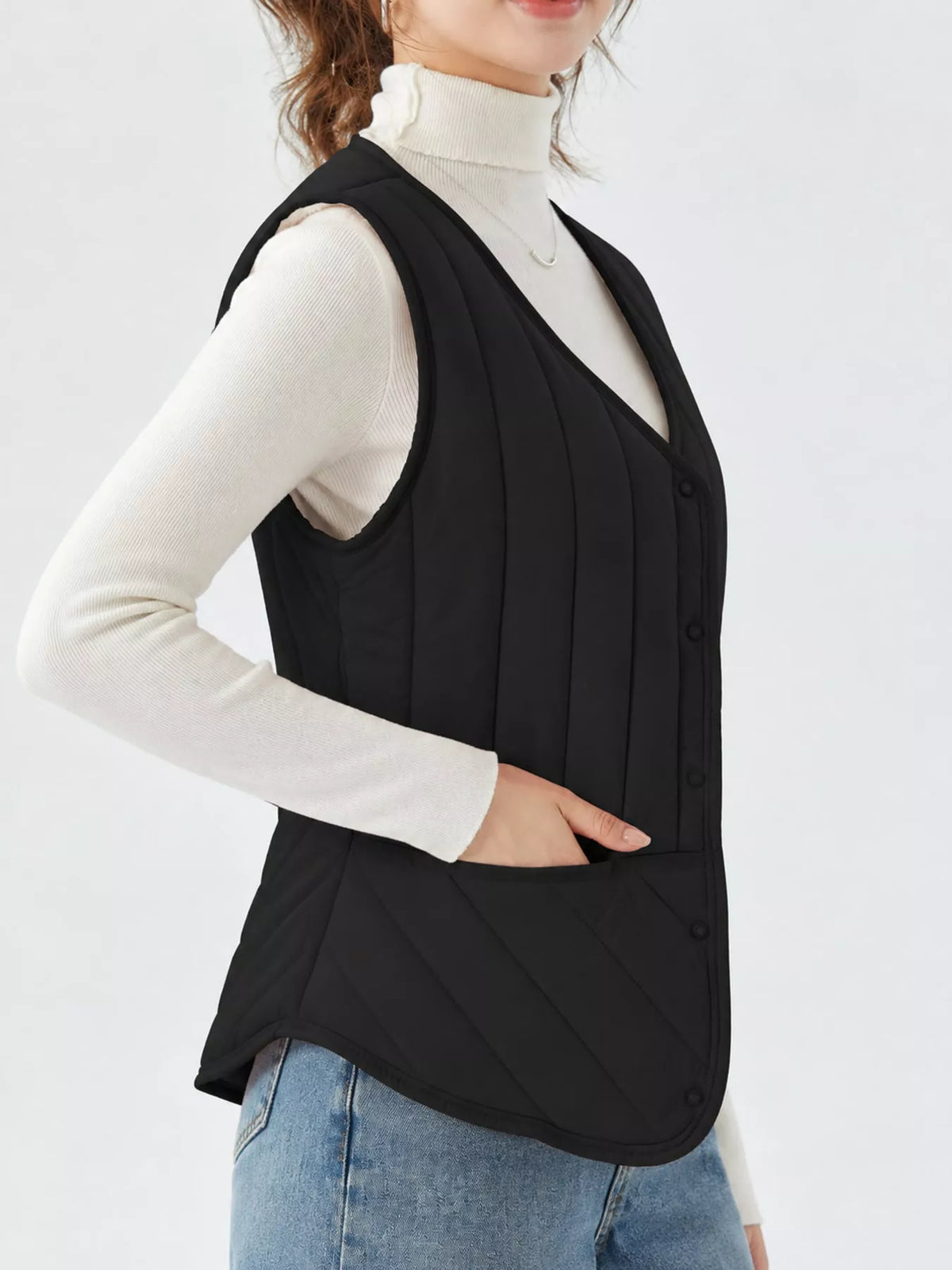 Quilted Button Up Vest in black, side view