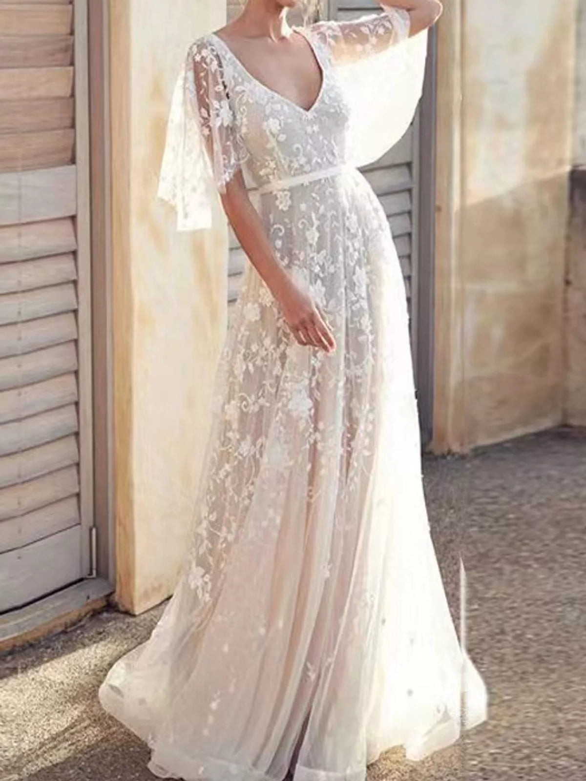 White lace v-neck maxi dress with flutter sleeves