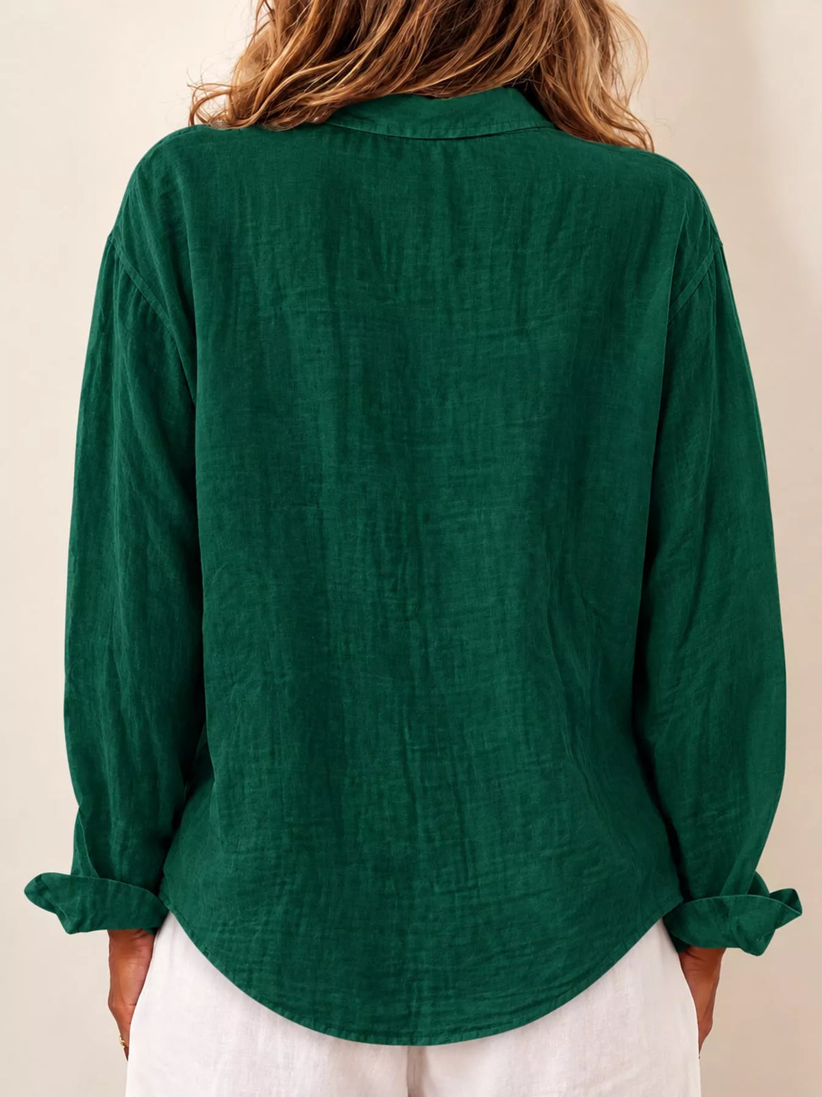 Green asymmetric button-down long sleeve shirt, back view