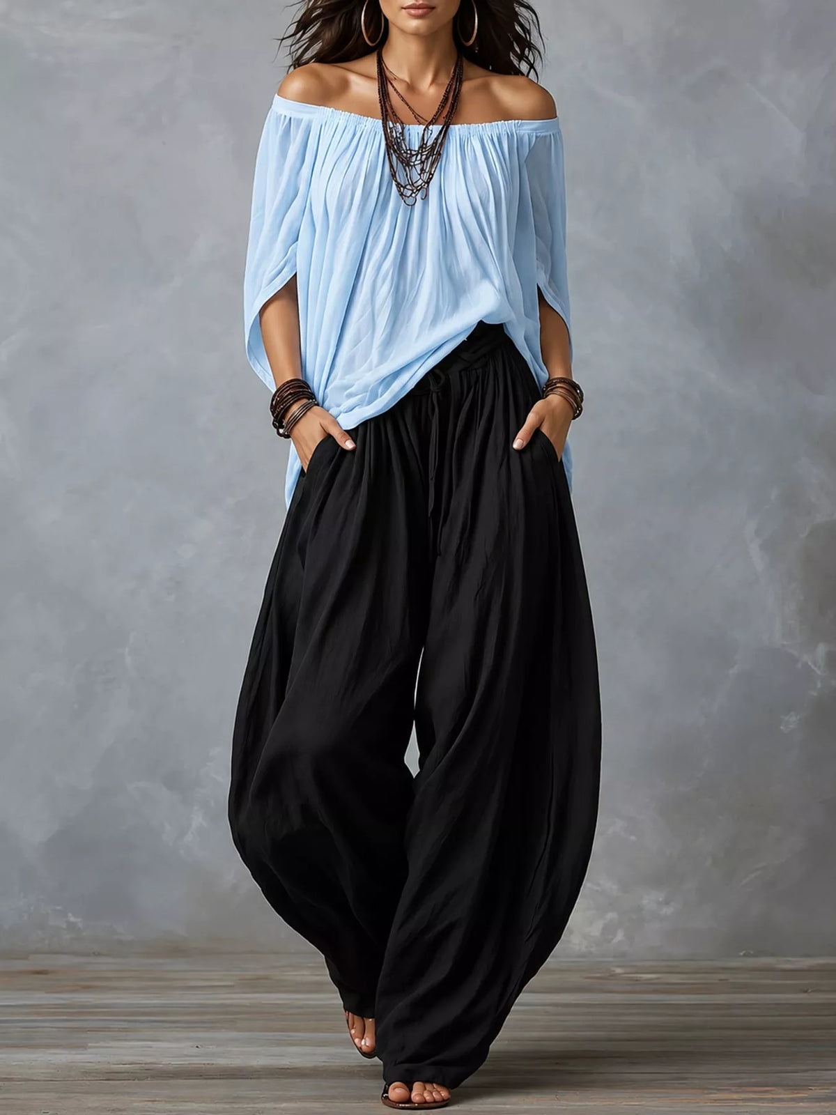 Light blue top and black pants off-shoulder top and wide-leg harem pants set — front view