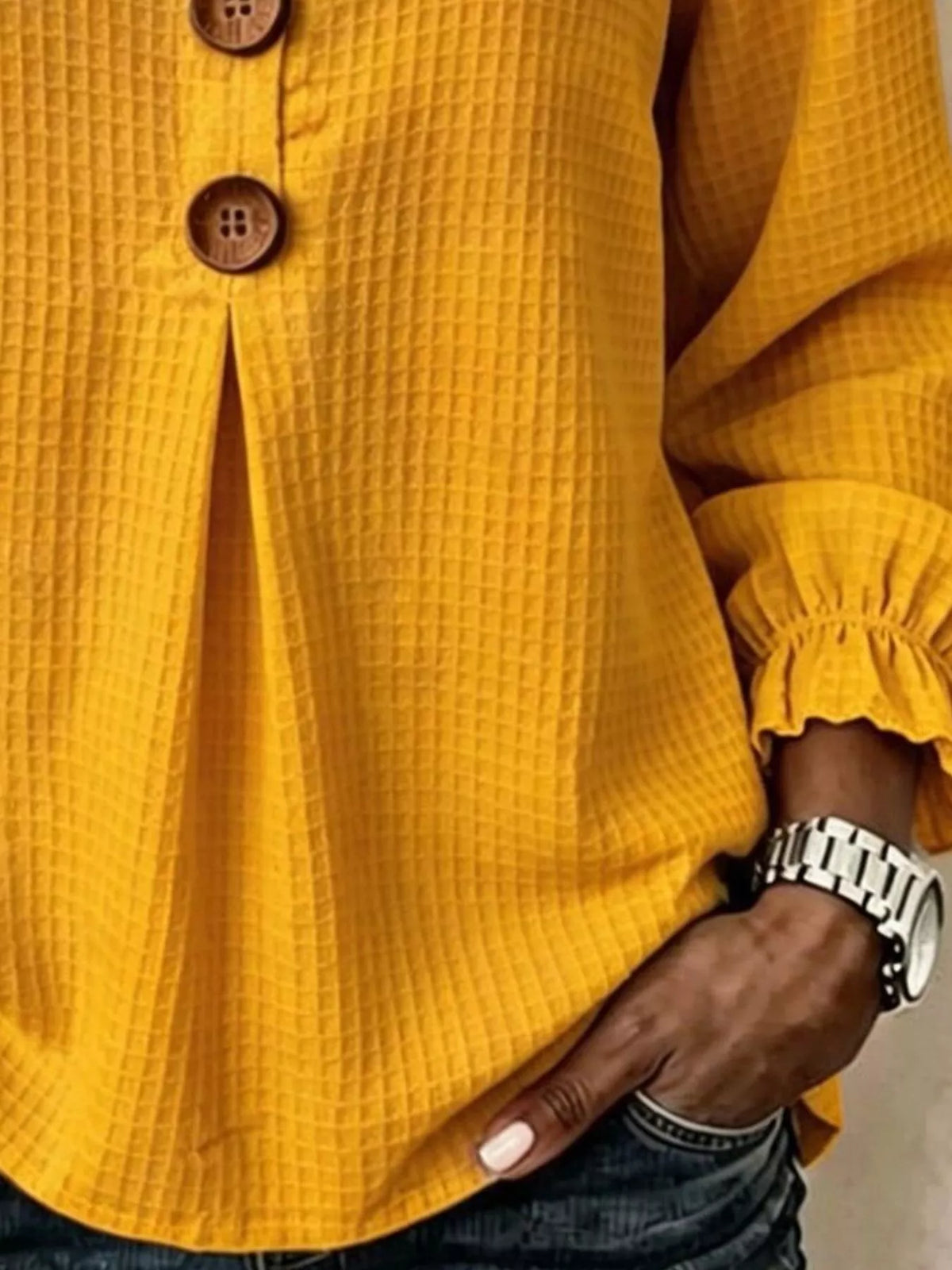 Mustard waffle knit blouse, waffle texture and flounce cuff