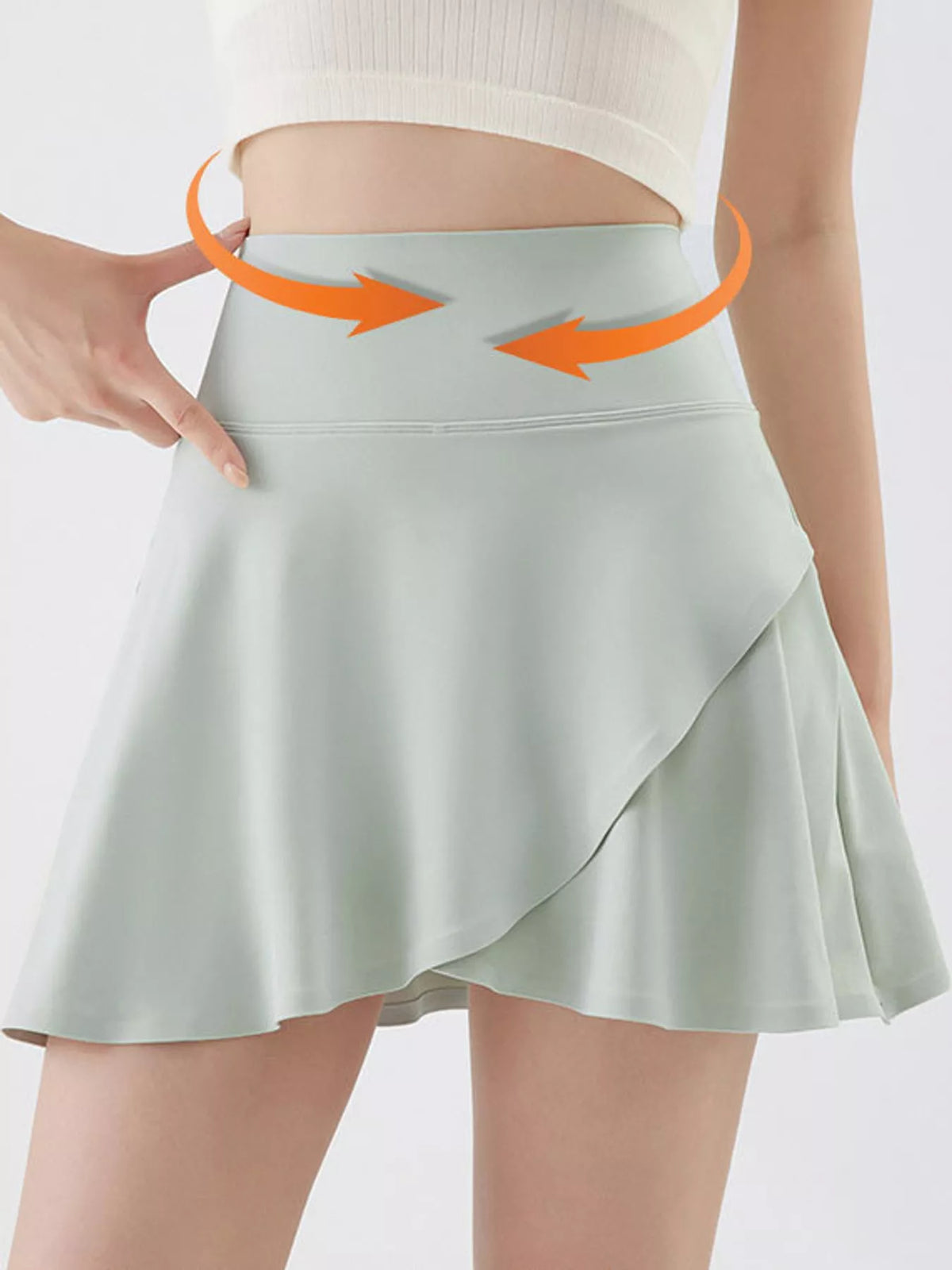 Green flared athletic skort, wide waistband and overlapping front panel